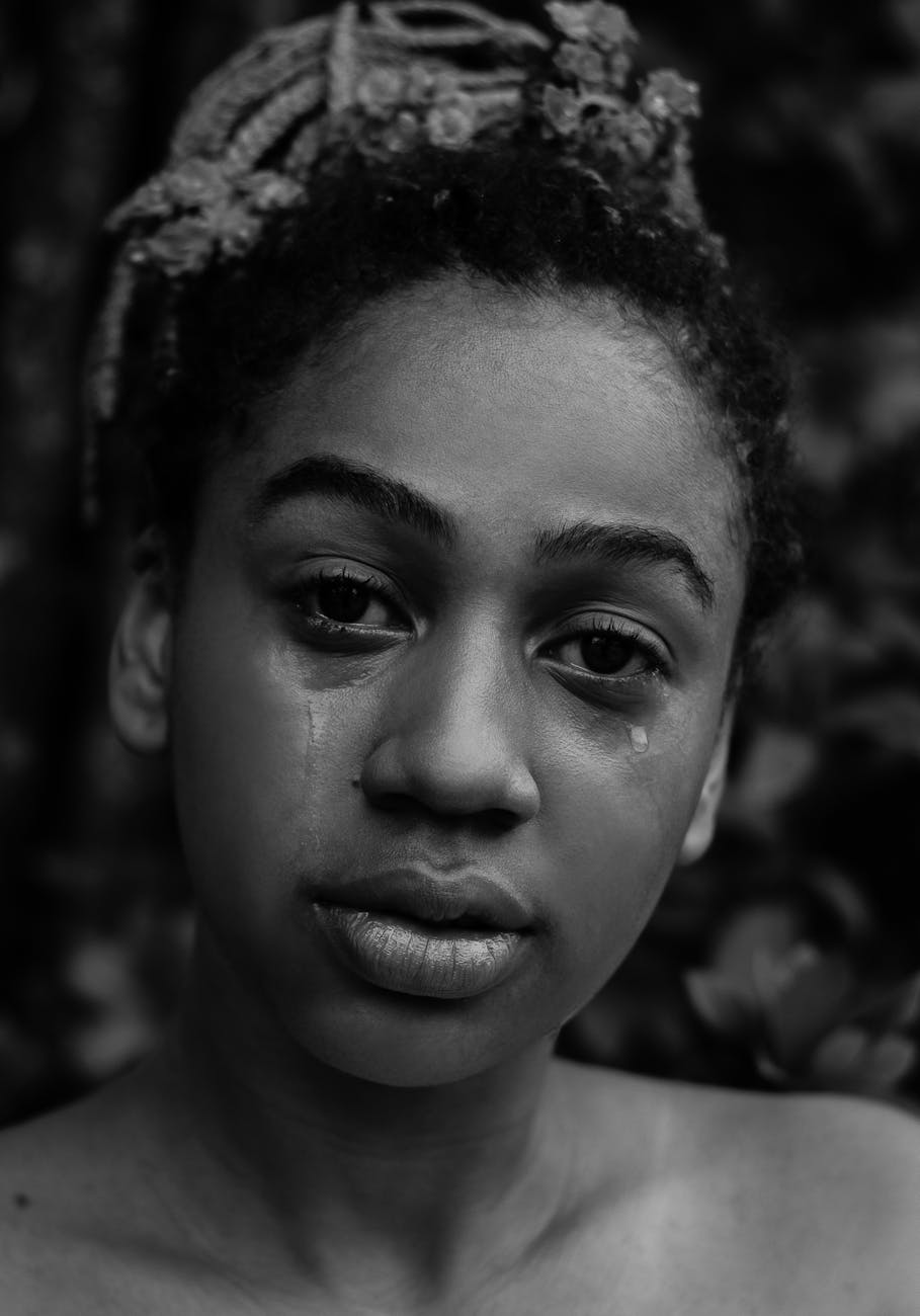 monochrome photo of girl crying