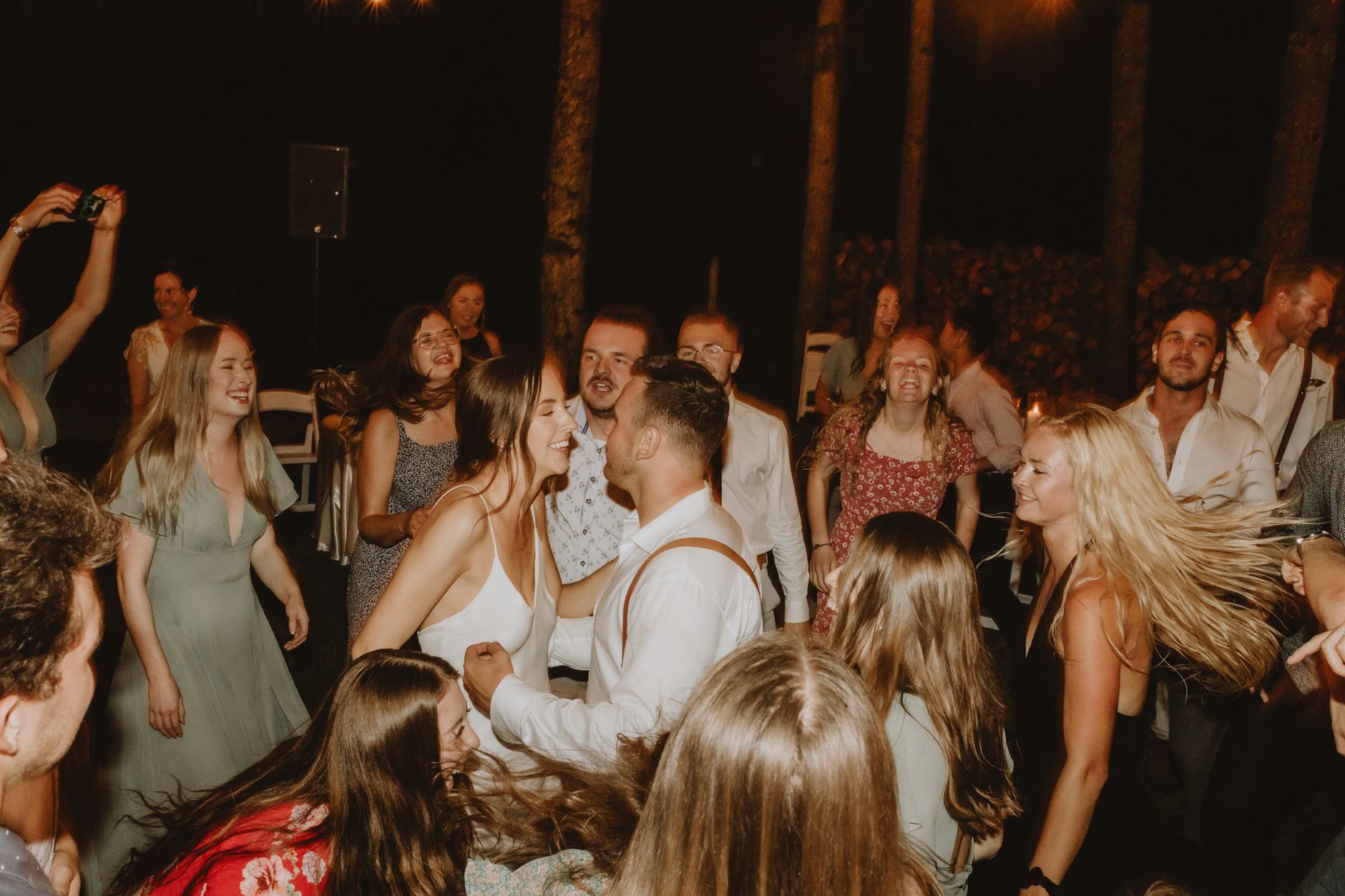 joyful outdoor wedding reception celebration
